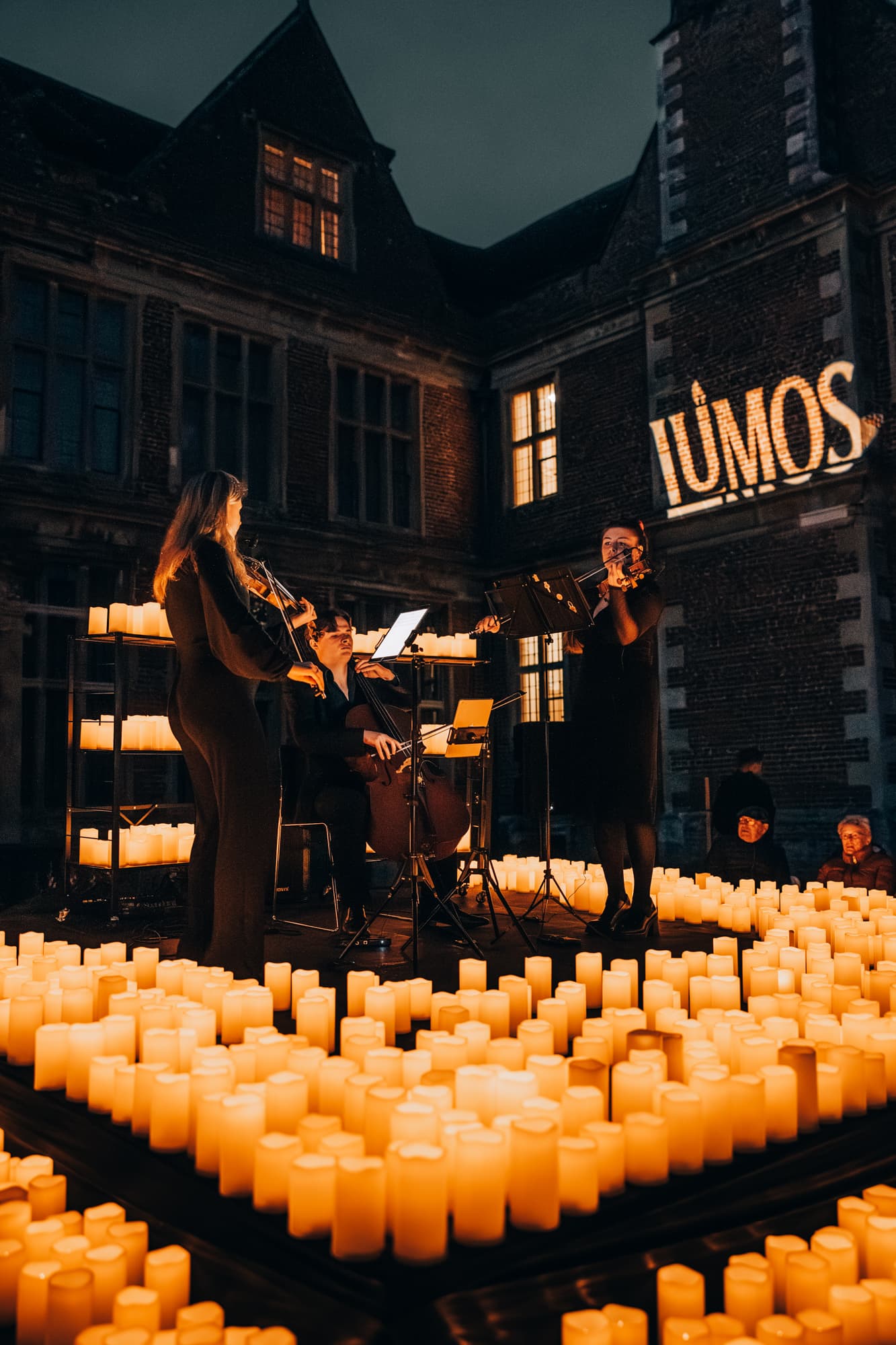 Musicians performing at dusk